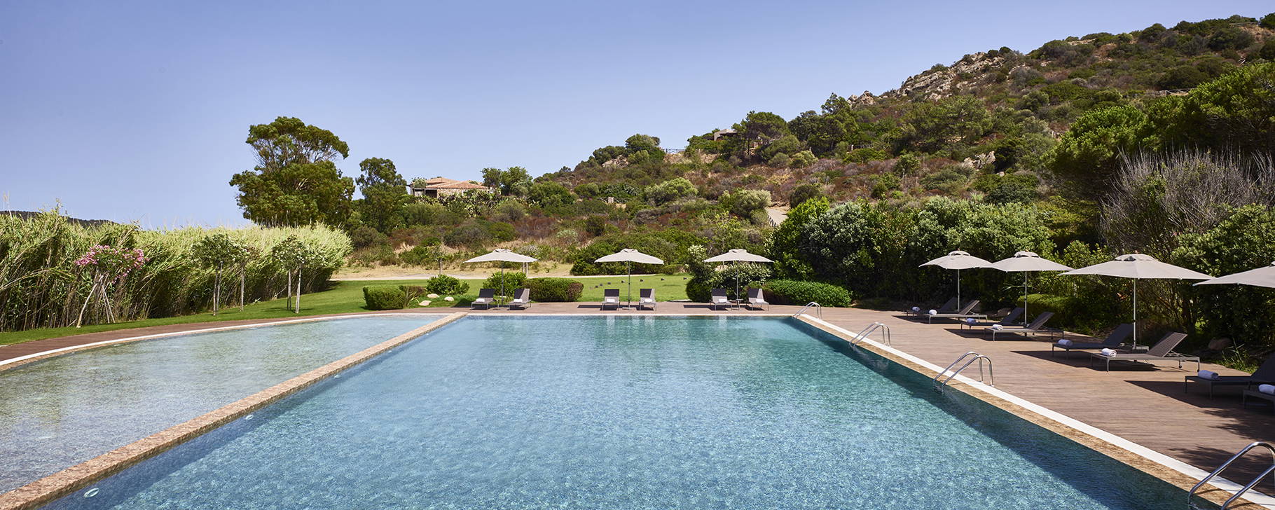 Pool - Baia di Chia Resort, Curio Collection by Hilton