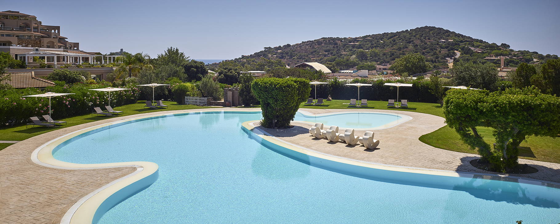 Poolanlage - Chia Laguna Hotel Village