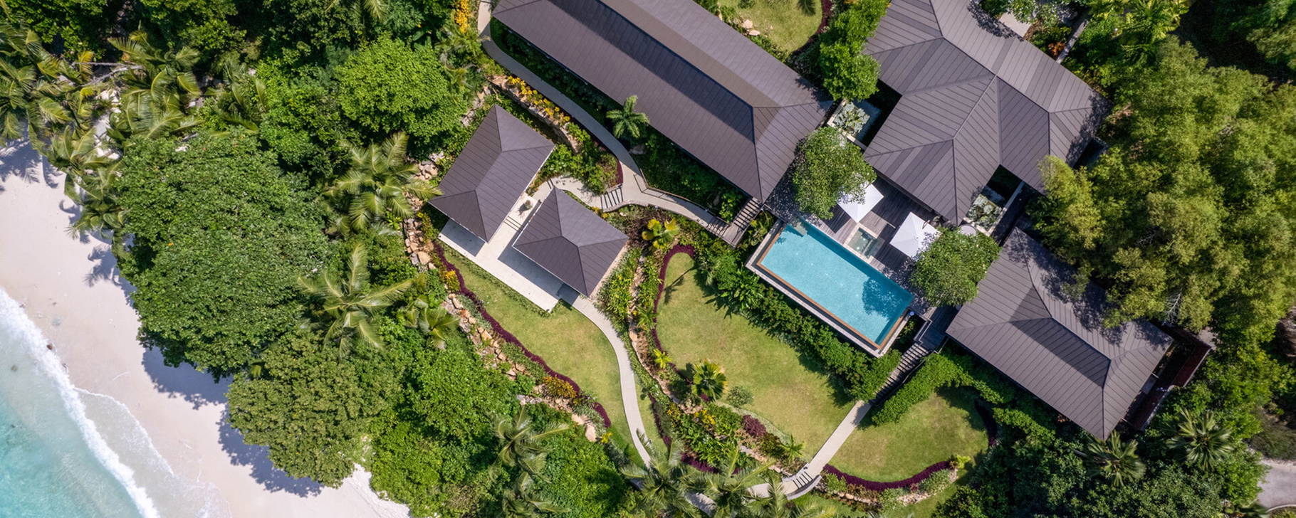 Pool und Strand - Four Seasons Resort Seychelles