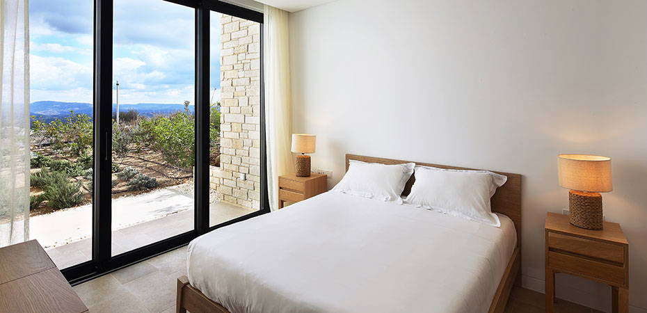 Schlafzimmer Doppelbett - Ridge Villa - Minthis Resort